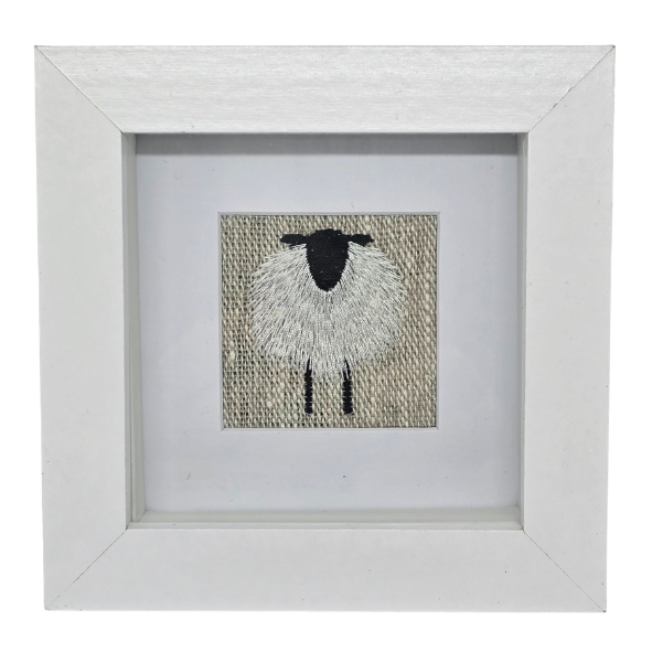 Small framed sheep on natural linen