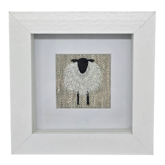 Small framed sheep on natural linen